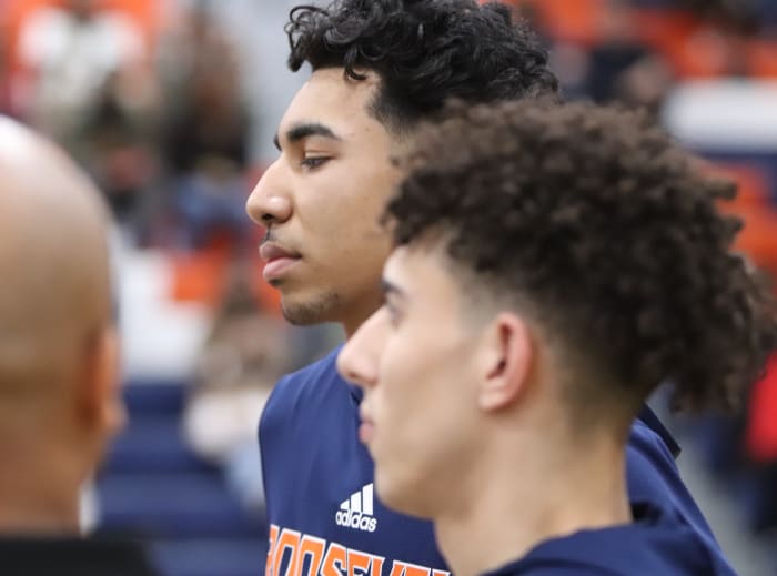Darnez Slater listens to pre-game instruction from officials.